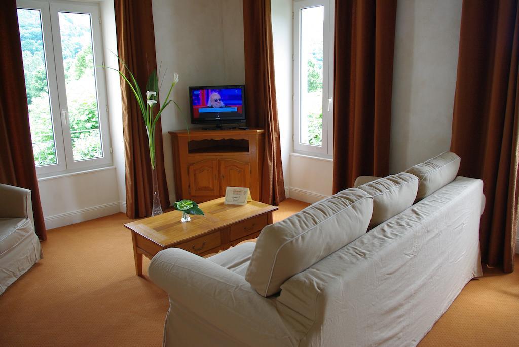 Hotel Beauséjour Vic-sur-Cère Habitación foto